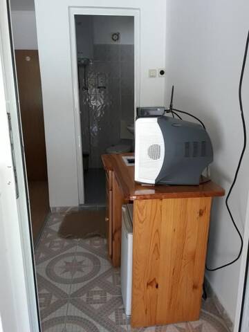Фото номера Трехместный номер с террасой Отель Hotel Sandim г. Кырджали 12