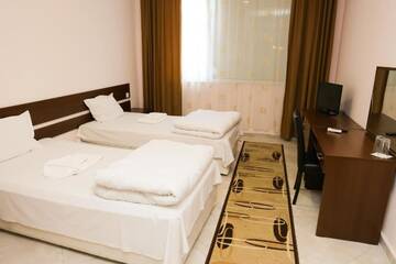 Фото номера Двухместный номер с 2 отдельными кроватями Отель Hotel Ida г. Кырджали 6